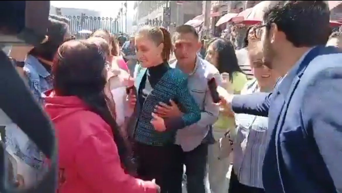 Título: Claudia Sheinbaum mantiene la calma tras incidente de acoso durante trayecto a la SEP